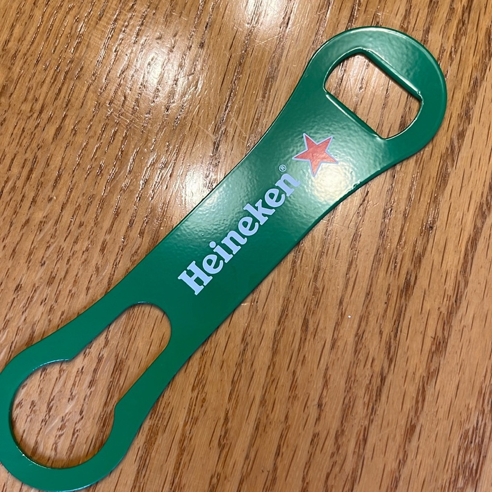 Paddle style beer bottle opener. Heineken. New. No packaging.